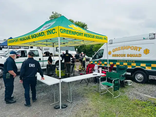 Custom Greenport Rescue Squad canopy tent at an EMS event